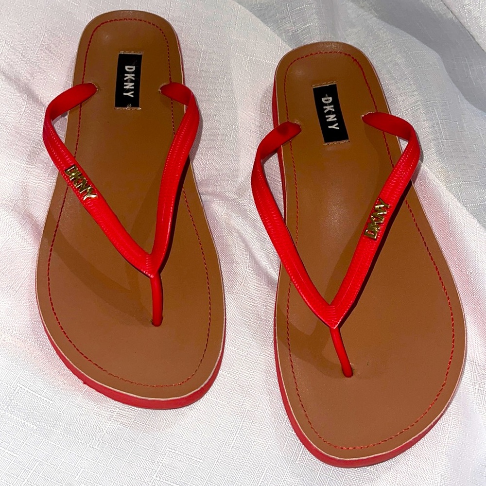 DKNY red flip flops size 8.5